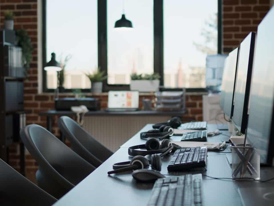 multiple headsets and laptops